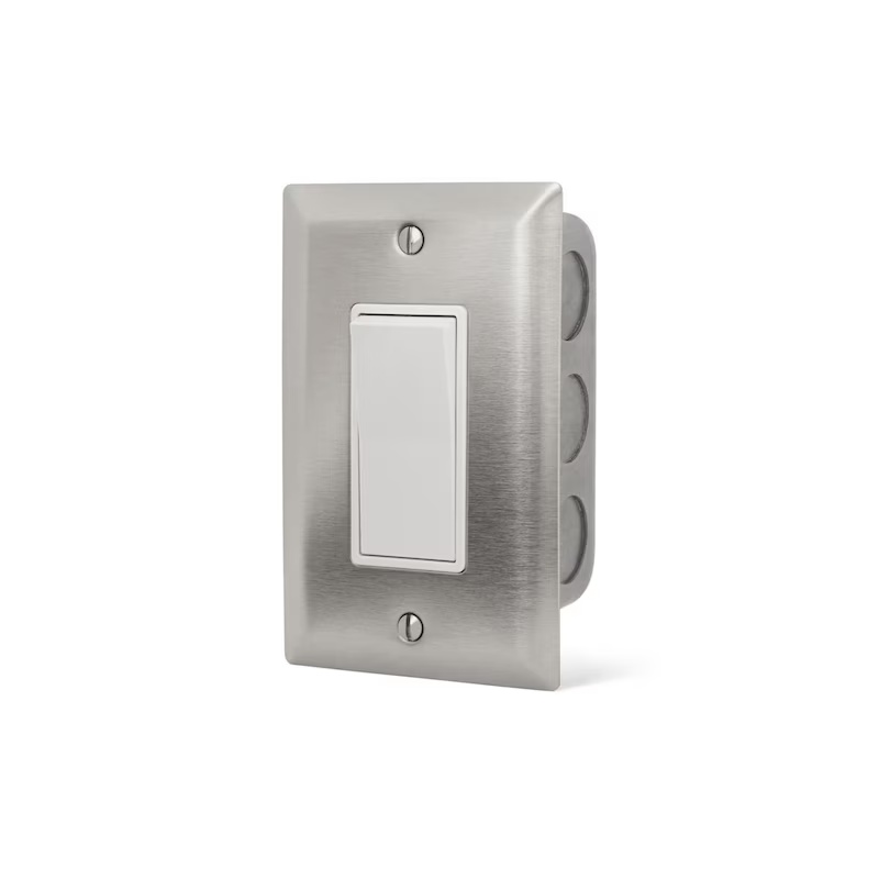 Brushed stainless steel light switch with a minimalist design and white toggle button. Ideal for modern home interiors.
