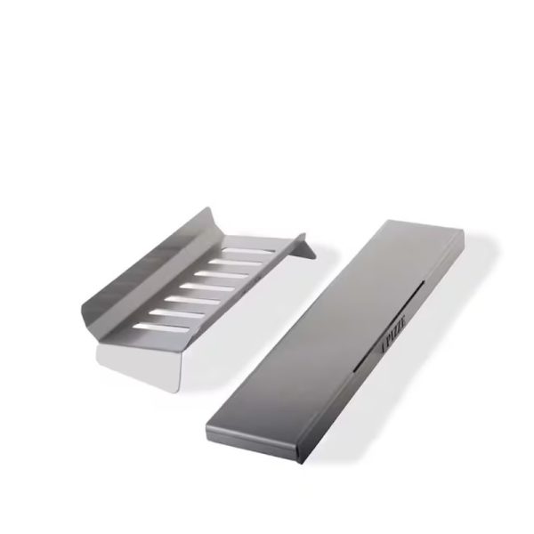 Stainless steel pizza oven accessories including a pizza peel and a grill scraper for easy handling and cleaning.