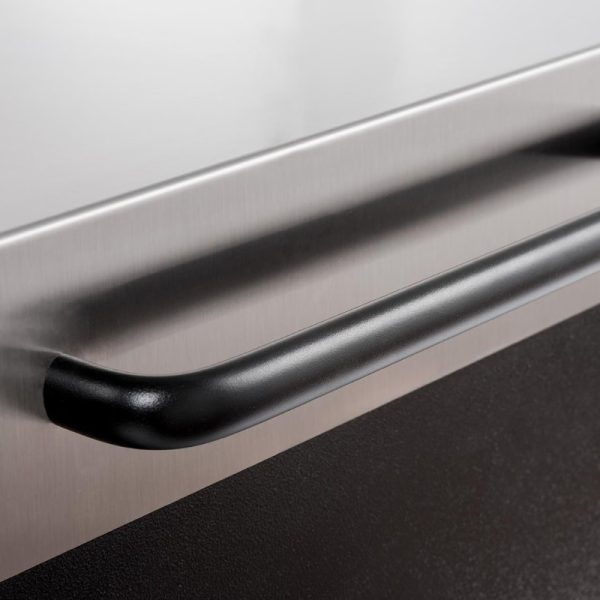 Close-up of a sleek black handle on a stainless steel appliance, highlighting modern kitchen design elements.