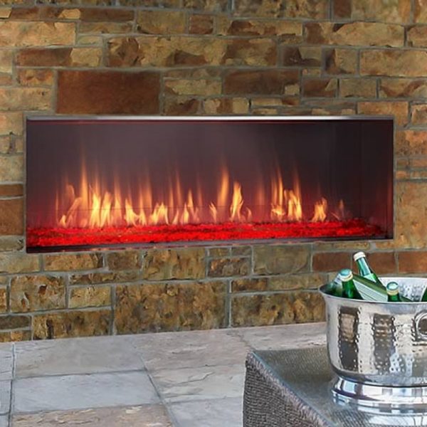 Modern electric fireplace embedded in a stone wall, featuring vibrant flames and glowing red embers, enhancing a stylish living space.