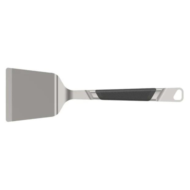Stainless steel spatula with a black rubber grip, ideal for flipping and serving food.