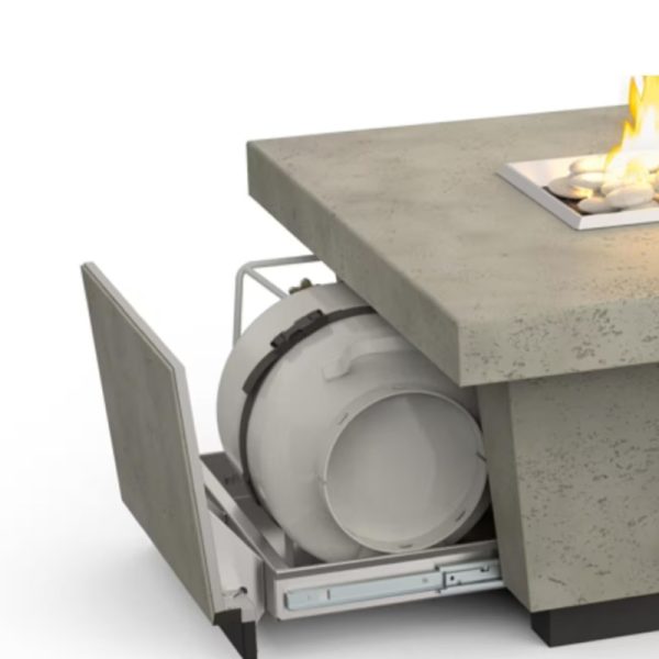 Modern outdoor kitchen setup featuring a built-in propane tank storage compartment beneath a stylish concrete countertop with a flame feature.