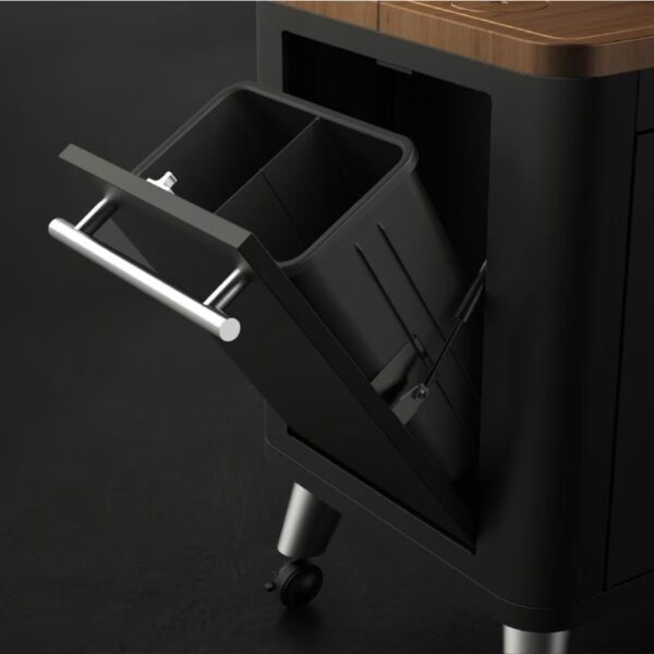 Modern kitchen trash bin with a pull-out drawer and sleek metal handle, designed for easy waste disposal and organization.