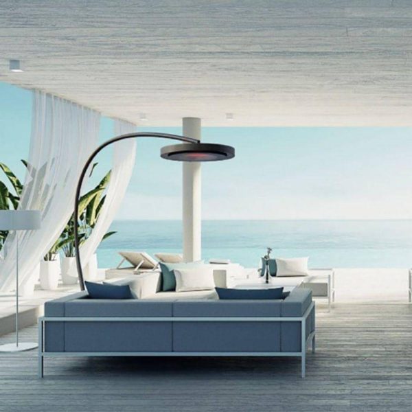 Modern coastal living room with a sleek sofa, stylish lamp, and ocean view. Bright, airy space featuring light colors and natural elements. Perfect for relaxation and comfort.