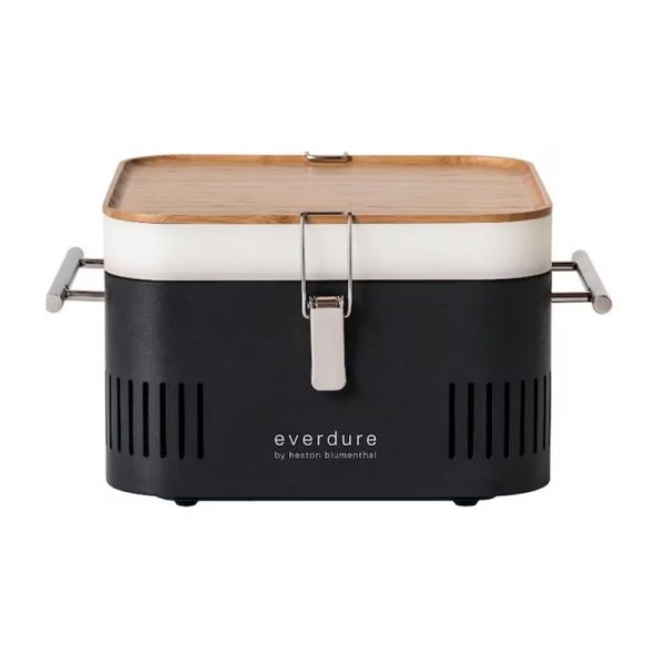 Everdure portable charcoal grill by Heston Blumenthal with a sleek black body and bamboo lid, designed for outdoor cooking.