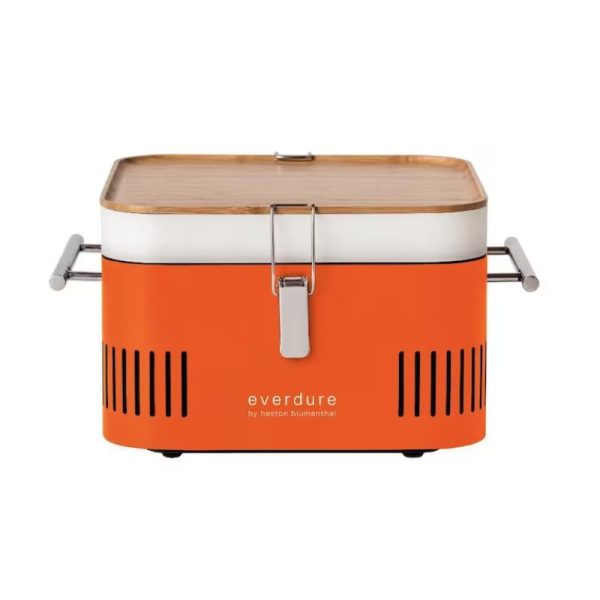 Bright orange Everdure portable grill with a bamboo lid, featuring a sleek design and metal handles, ideal for outdoor cooking.