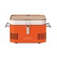 Bright orange Everdure portable grill with a bamboo lid, featuring a sleek design and metal handles, ideal for outdoor cooking.