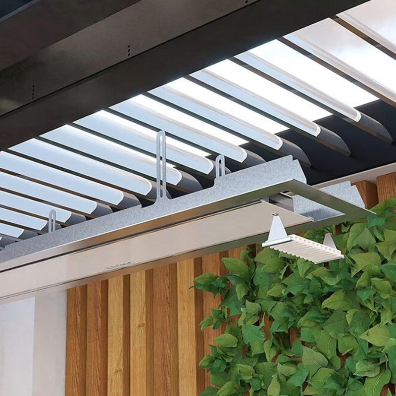 Modern outdoor pergola with adjustable slats, featuring sleek metal design and integrated lighting, surrounded by lush greenery and wooden accents.