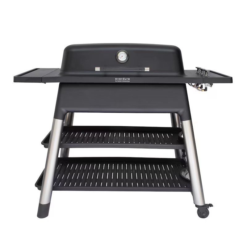 Black outdoor gas grill with stainless steel legs and shelves, featuring a built-in thermometer and side burners for cooking versatility.