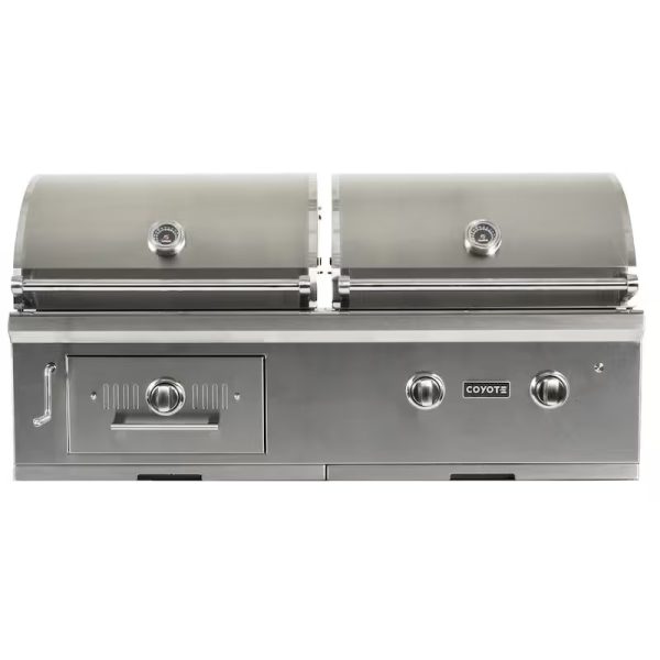 Coyote stainless steel dual-burner outdoor grill with two domed lids and front control panel, ideal for backyard cooking and entertaining.