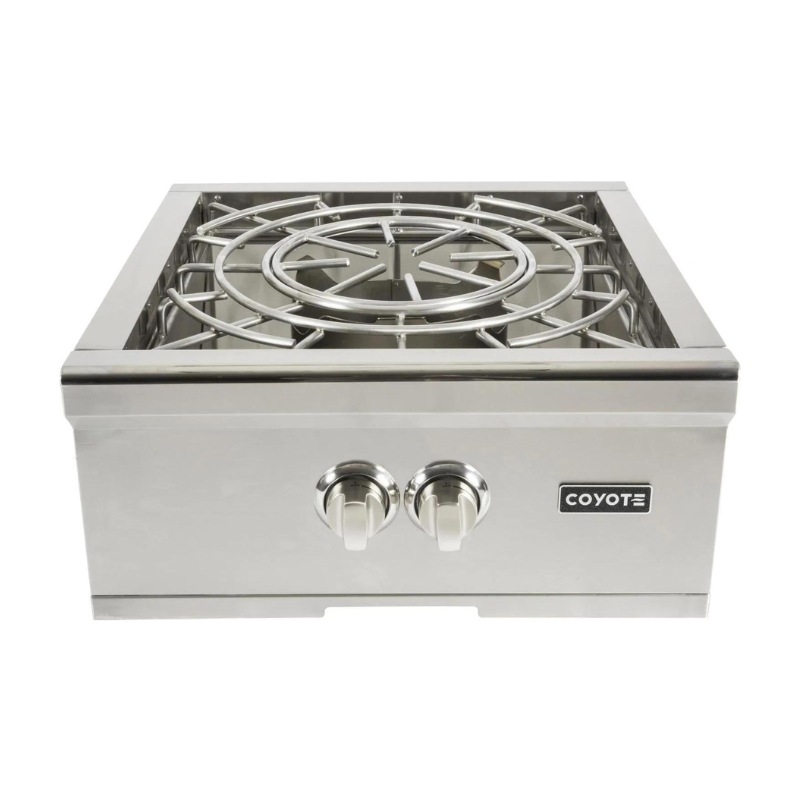 Coyote stainless steel outdoor gas burner with two control knobs and circular cooking grate, designed for efficient grilling and cooking.