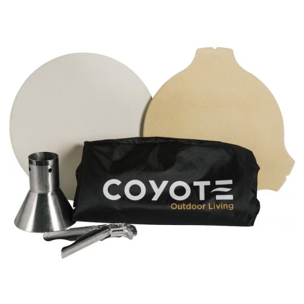 Coyote Outdoor Living pizza oven accessory kit featuring a stainless steel funnel, two pizza stones, and a carrying bag.