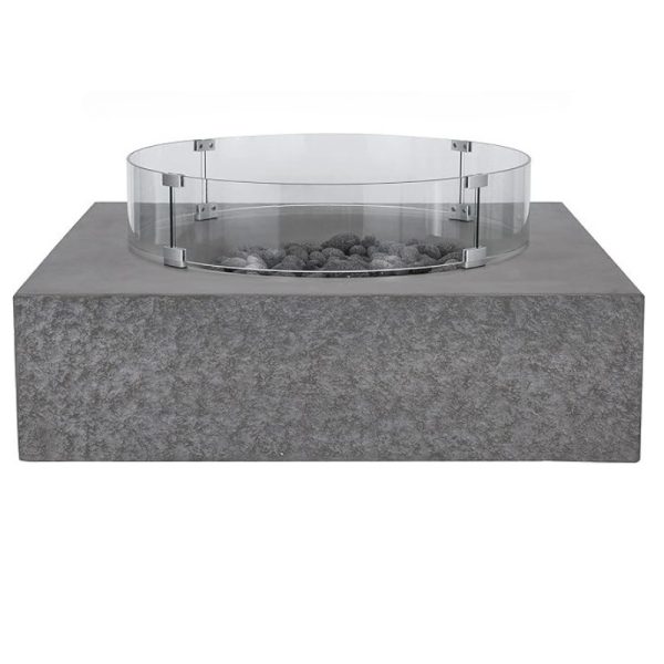 Modern concrete fire pit with glass surround and decorative stones, ideal for outdoor gatherings and ambiance.