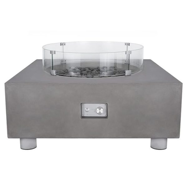 Modern outdoor fire pit with a sleek concrete design, glass wind guard, and decorative lava rocks. Ideal for enhancing outdoor spaces and gatherings.