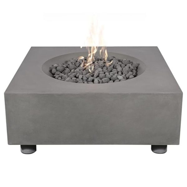 Modern square concrete fire pit with a central flame and decorative lava rocks, ideal for outdoor gatherings.