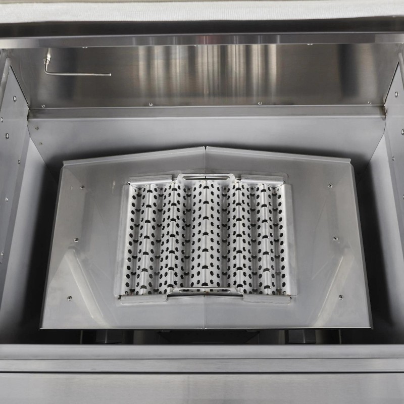 Stainless steel appliance interior featuring a perforated roller system designed for efficient cooking or food preparation.