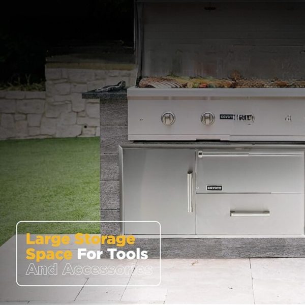 Coyote outdoor grill featuring large storage space for tools and accessories, ideal for backyard cooking and entertaining.