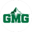 GMG logo featuring green mountains and bold text, representing outdoor adventure and sustainability.