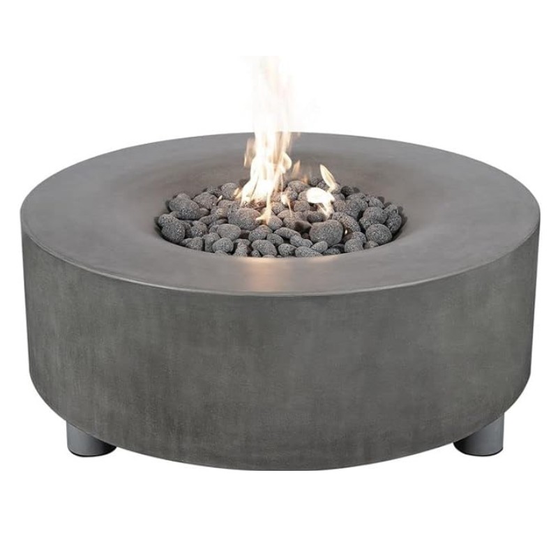 Modern circular concrete fire pit with decorative stones and flames, ideal for outdoor gatherings and ambiance.