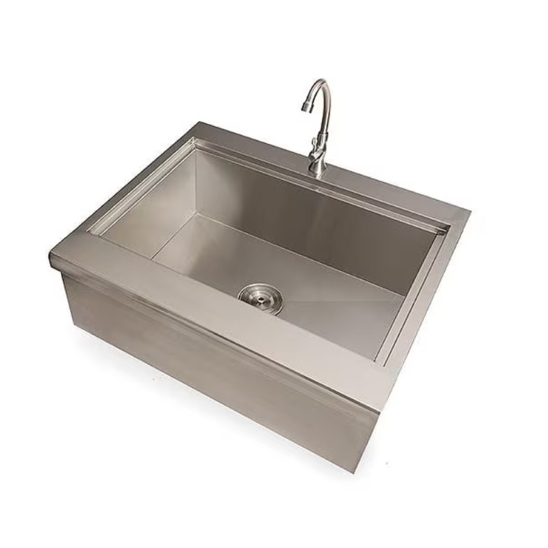 Stainless steel farmhouse sink with a modern design and a sleek faucet, ideal for kitchen renovations.