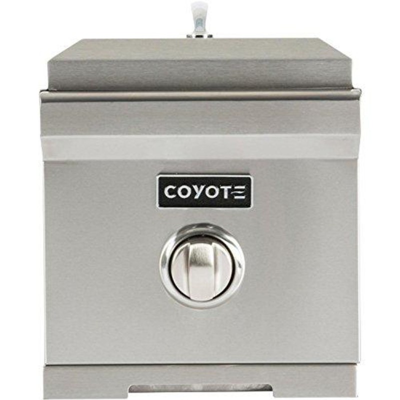 Coyote stainless steel outdoor refrigerator with a sleek design and adjustable temperature control knob, ideal for outdoor kitchens and grilling environments.