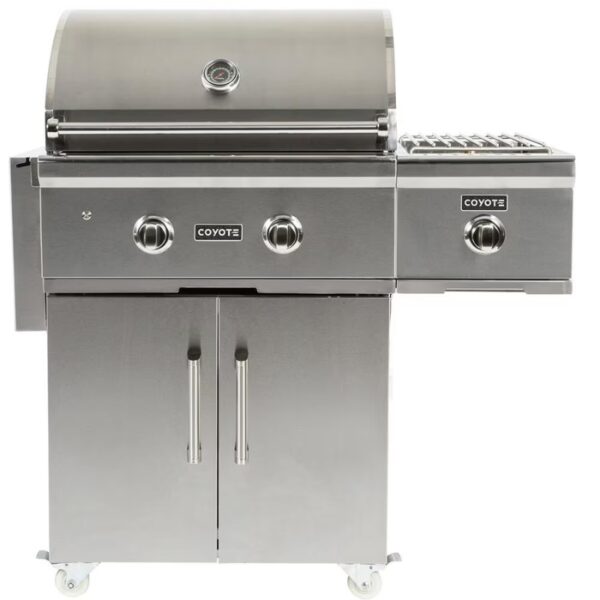 Stainless steel Coyote gas grill with dual burners and side burner, featuring a sleek design and storage cabinet on wheels. Perfect for outdoor cooking and barbecues.