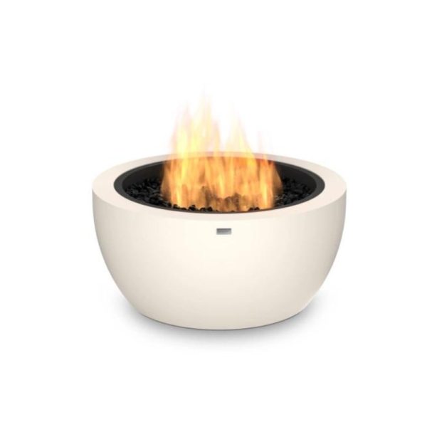Modern outdoor fire pit with flames and black decorative stones, featuring a sleek white design for stylish backyard gatherings.