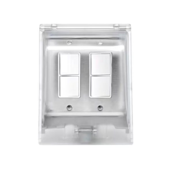 Clear plastic electrical switch cover with two metallic switches. Ideal for modern home decor and functionality.