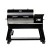 Black and stainless steel pellet grill with digital control, featuring two handles and a side shelf on wheels for easy mobility.
