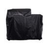 Recteq grill cover in black, designed for protection against outdoor elements, ensuring durability and longevity for your grill.