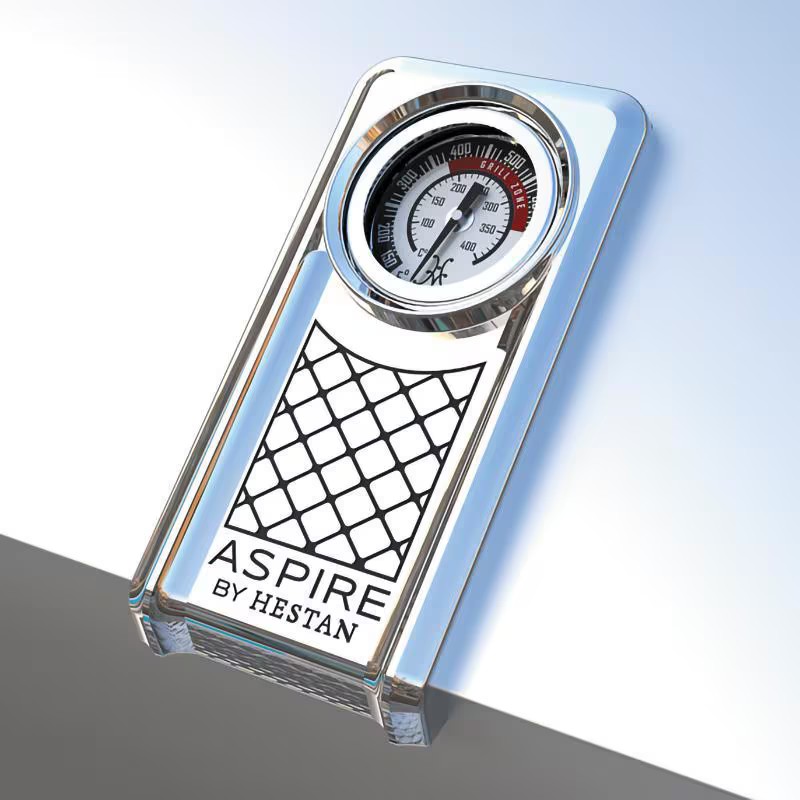 Aspire by Hestan temperature gauge featuring a sleek design with a clear dial for precise cooking temperature readings. Ideal for grilling and outdoor cooking enthusiasts.