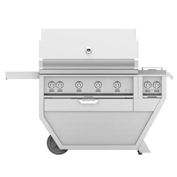 Stainless steel gas grill with six burners and a spacious cooking area, featuring a side shelf and wheels for mobility.