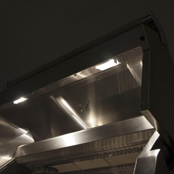 Stainless steel kitchen hood with built-in lighting, showcasing a sleek design for efficient ventilation and illumination in cooking spaces.
