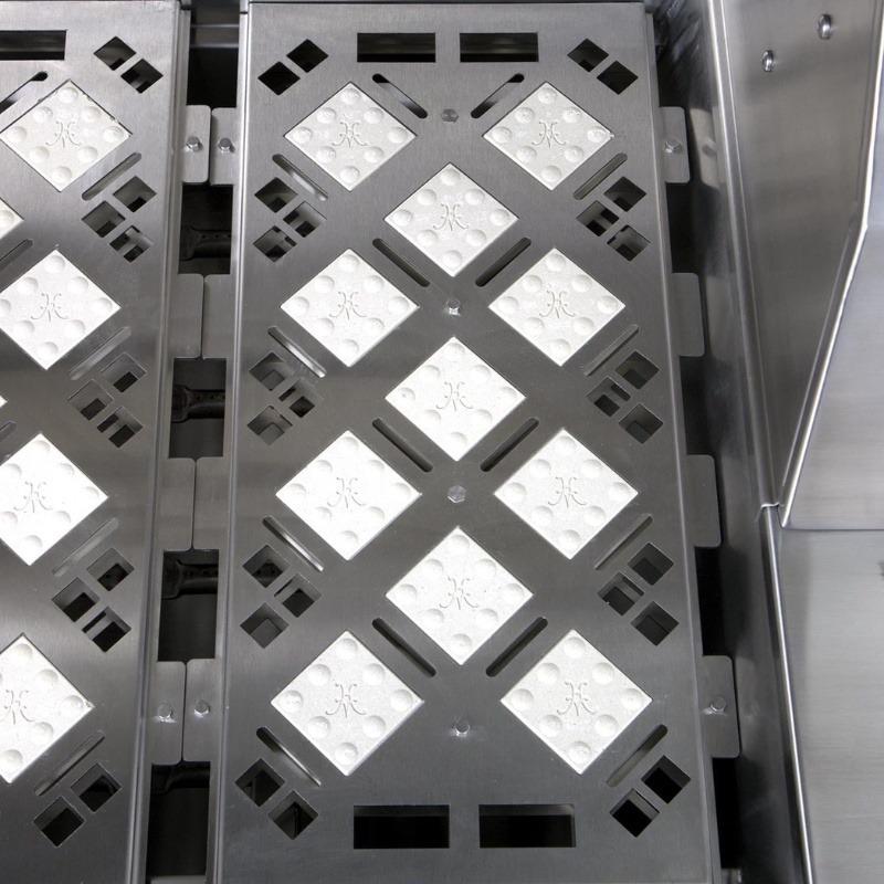 Stainless steel grill plates with diamond-patterned design for enhanced cooking efficiency and heat distribution.