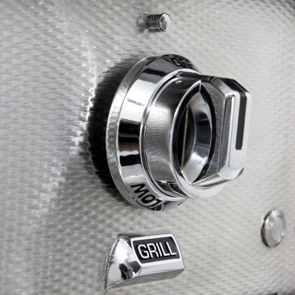 Close-up of a stainless steel grill control knob with "OFF" and "GRILL" labels, showcasing a modern design and chrome finish.