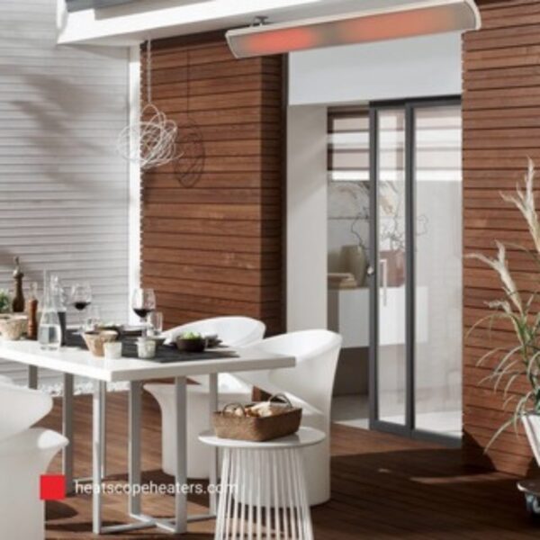 Modern outdoor dining area featuring a white table and chairs, wooden walls, and a heating lamp overhead, creating a cozy ambiance.