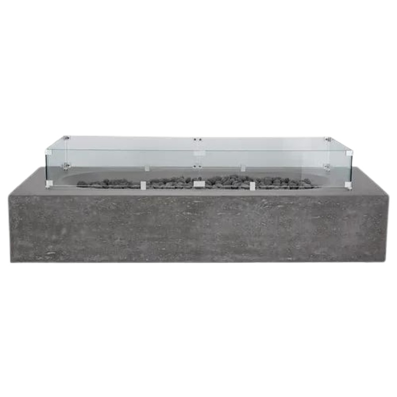 Modern concrete fire pit table with glass wind guard and decorative stones. Ideal for outdoor gatherings and enhancing patio aesthetics.