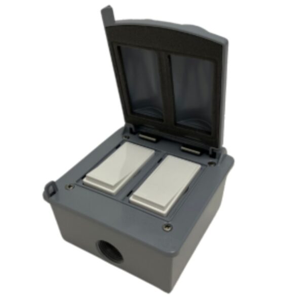 Gray outdoor electrical junction box with a hinged lid and two white switches inside. Ideal for weatherproof electrical connections.