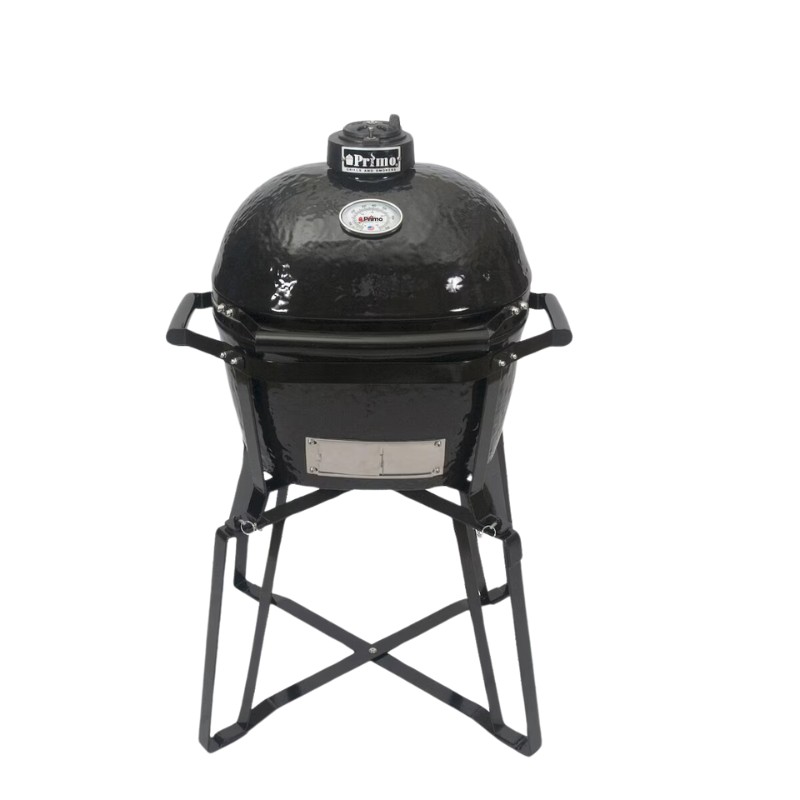 Black ceramic kamado grill on a sturdy stand, designed for versatile outdoor cooking and grilling.