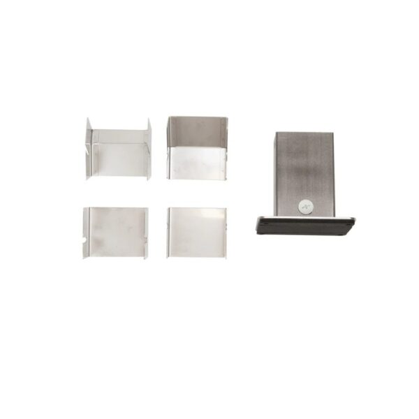 Stainless steel kitchen organizer set featuring four small containers and one vertical holder for efficient storage.