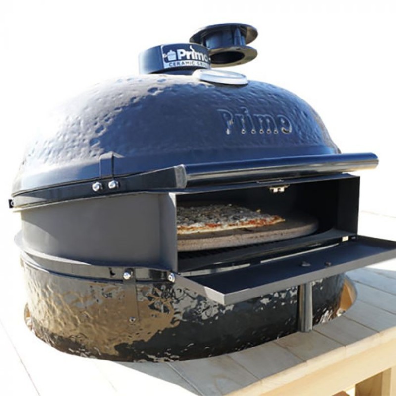 Black ceramic pizza oven with a stone surface, featuring an open door displaying a pizza inside, ideal for outdoor cooking.