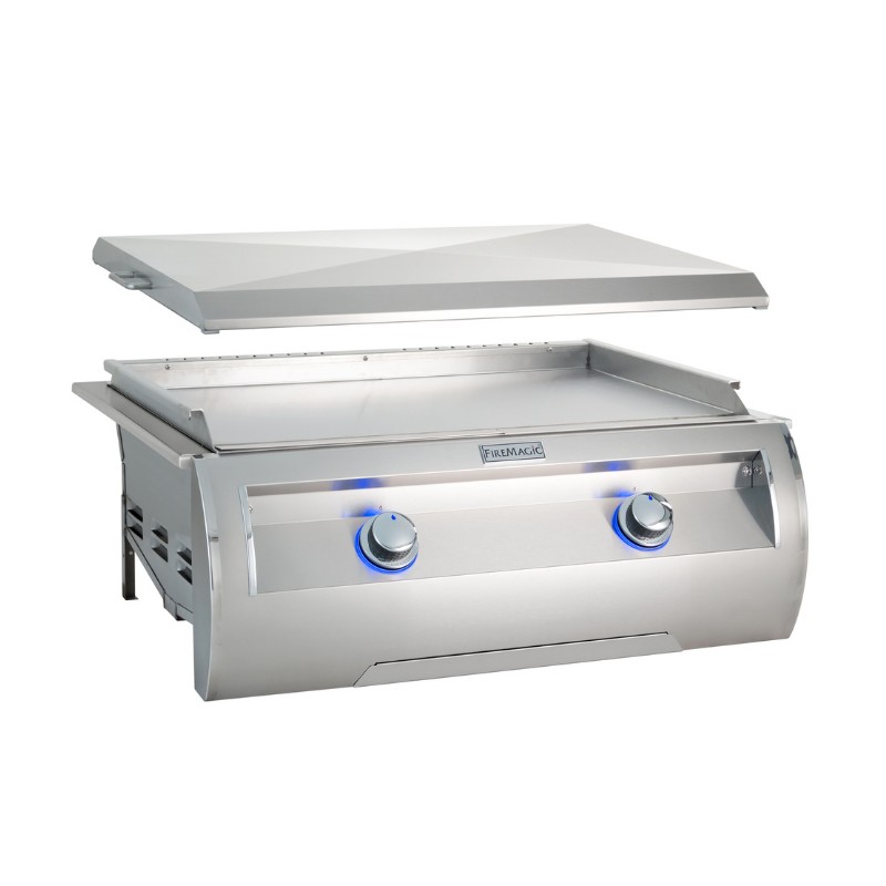 Stainless steel outdoor grill with a raised lid and illuminated control knobs, designed for high-performance cooking.