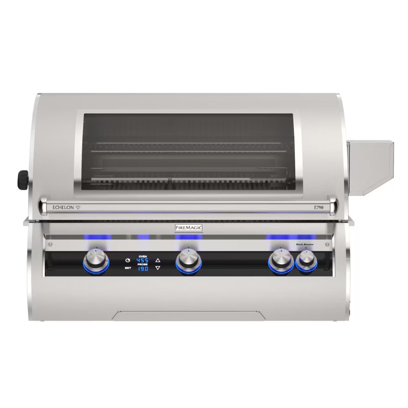 Fire Magic Echelon E790 gas grill with stainless steel finish, featuring illuminated control knobs and a large cooking chamber for outdoor grilling.