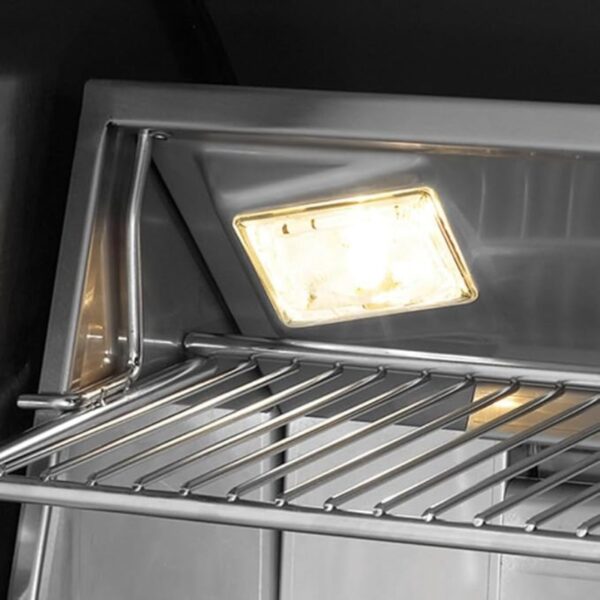 Interior view of a refrigerator showcasing a bright light and stainless steel wire shelves, highlighting storage space and illumination features.