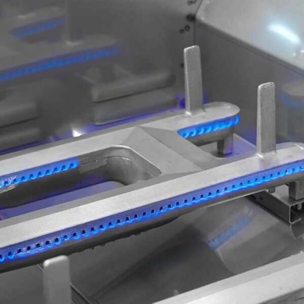 Close-up of a stainless steel grill burner with blue flames, showcasing its design and functionality for efficient cooking.