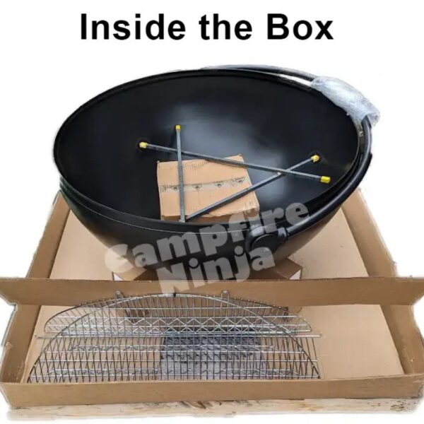 Contents of a camping cooking kit box, featuring a black cooking pot, metal support rods, packaging paper, and a wire grill.