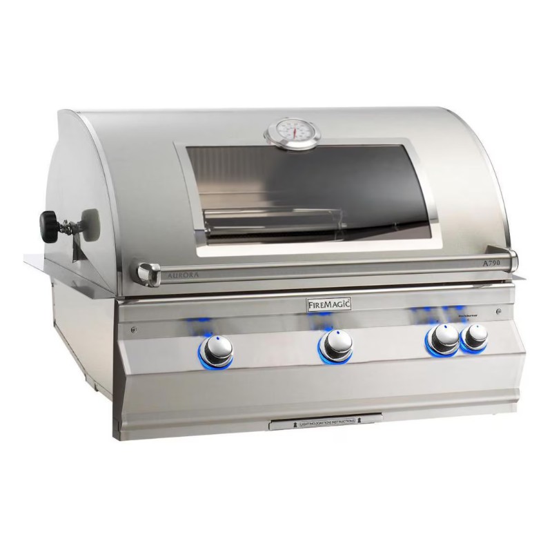 Fire Magic Aurora Built-In Gas Grill Stainless steel outdoor gas grill with a built-in thermometer and three control knobs, featuring a sleek design and modern finish.
