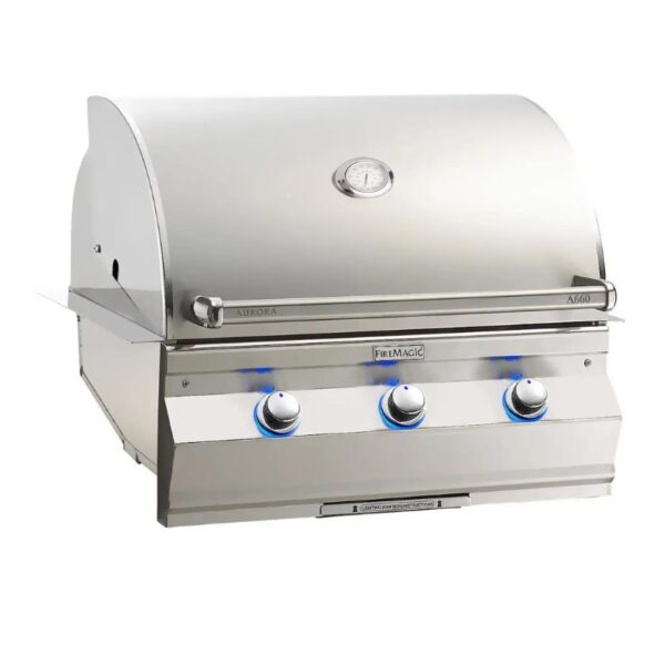 Stainless steel Fire Magic Aurora A660 grill with three control knobs and built-in thermometer. Ideal for outdoor cooking and barbecuing.