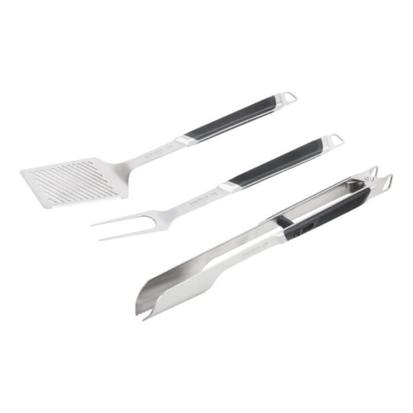Set of stainless steel grilling tools including a spatula, fork, and tongs with rubberized handles for superior grip and control.