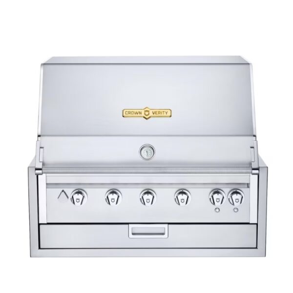 Stainless steel Crown Verity outdoor grill with five control knobs and a pull-out drawer, ideal for backyard barbecues.